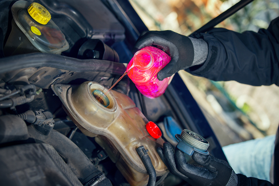 Adding antifreeze to car engine