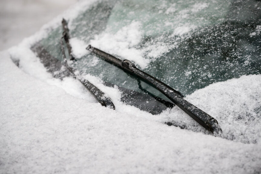Snow-covered windshield wipers