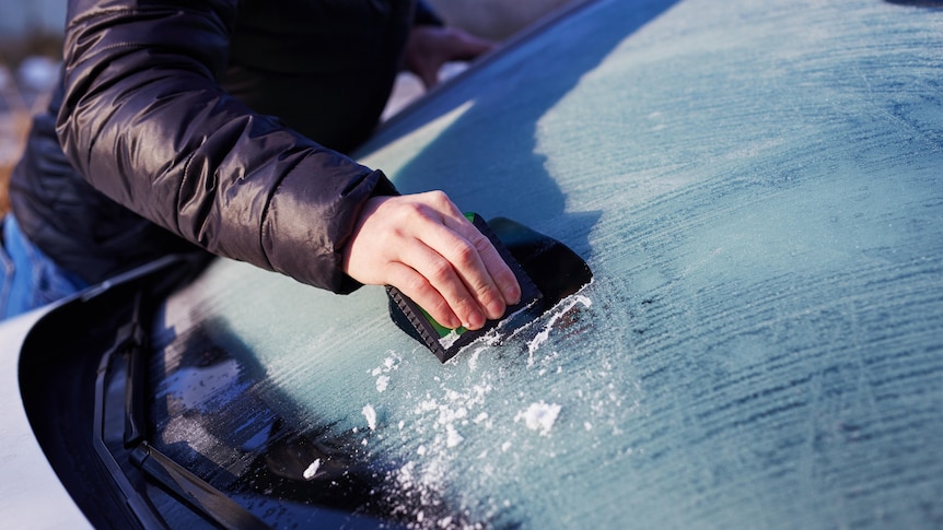 Clearing ice from windshield