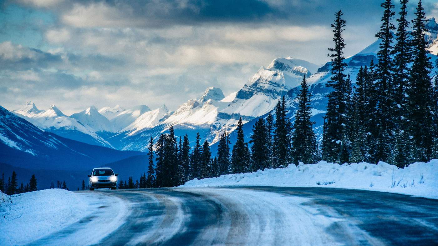 Winter driving on snowy Canadian road